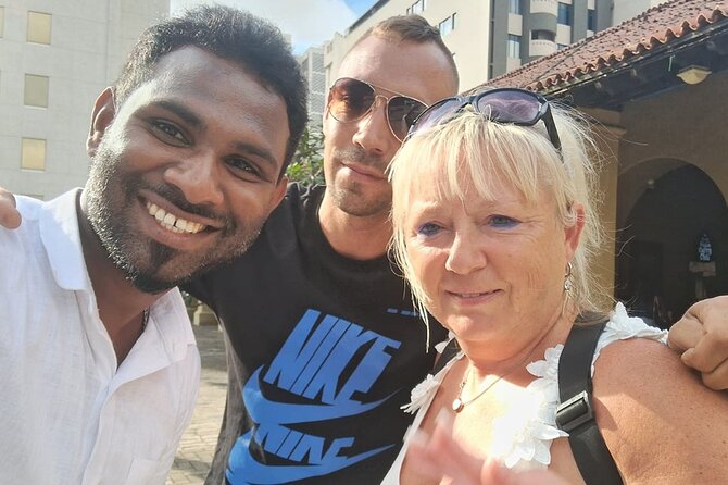 Colombo tuk tuk city tour -Entry Fees, and food Included - Lotus Tower, then Pettah Floating Market: modern view and market energy