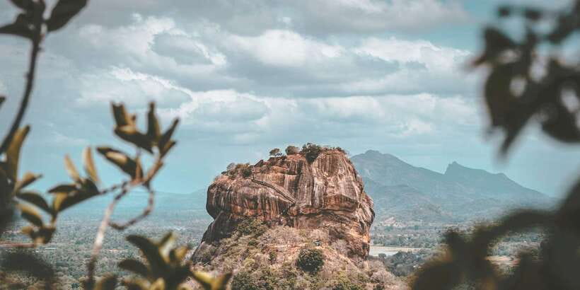 From Colombo: Sigiriya and Dambulla Day Trip with Safari - Dambulla Cave Temple: murals, golden statues, and a calmer morning mood