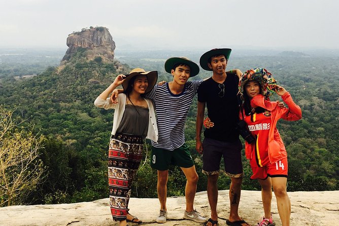Kandy to Sigiriya Day Tour and Dambulla cave temple with private vehicle - Stop 4: Dambulla Cave Temple, Art, Atmosphere, and More Steps
