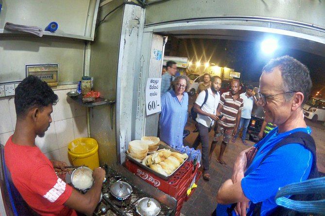 Luxury Night Cycle Tour of Colombo - Gangaramaya Temple by Beira Lake: a quieter pause