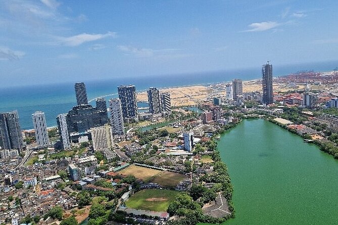 Ride and Explore Colombo and Food By Tuk Tuk Tour All Inclusive - Gangaramaya Temple and the Hindu Shrine: Two Traditions, One Route