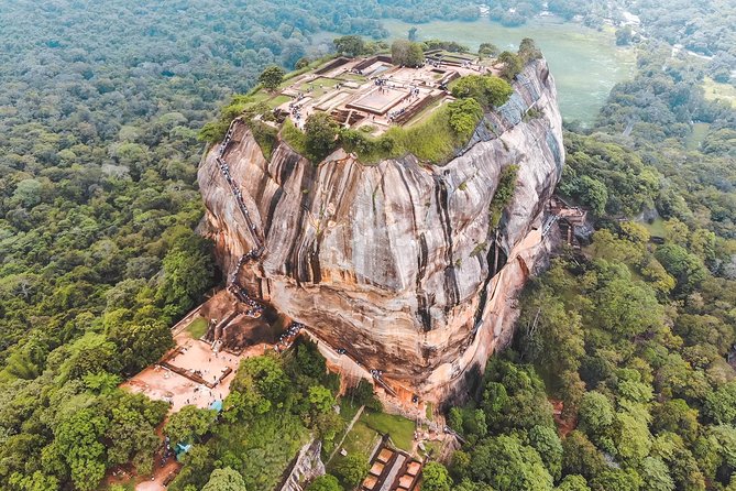 Sigiriya Day Tour From Colombo - Sigiriya Rock Fortress: Lion Paws, murals, cisterns, and palace tunnels