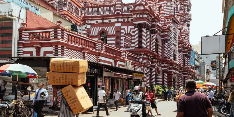 The True Essence of Colombo:Private Highlights & Hidden Gems - Markets and cassava chips: watching Colombo trade